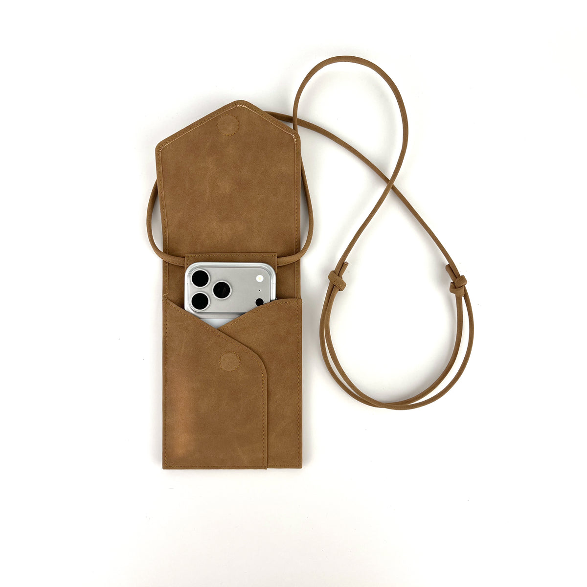 A suede brown plant=based leather phone pouch with a matching adjustable neck strap, shown on a clean white background with a silver smartphone partially tucked inside.