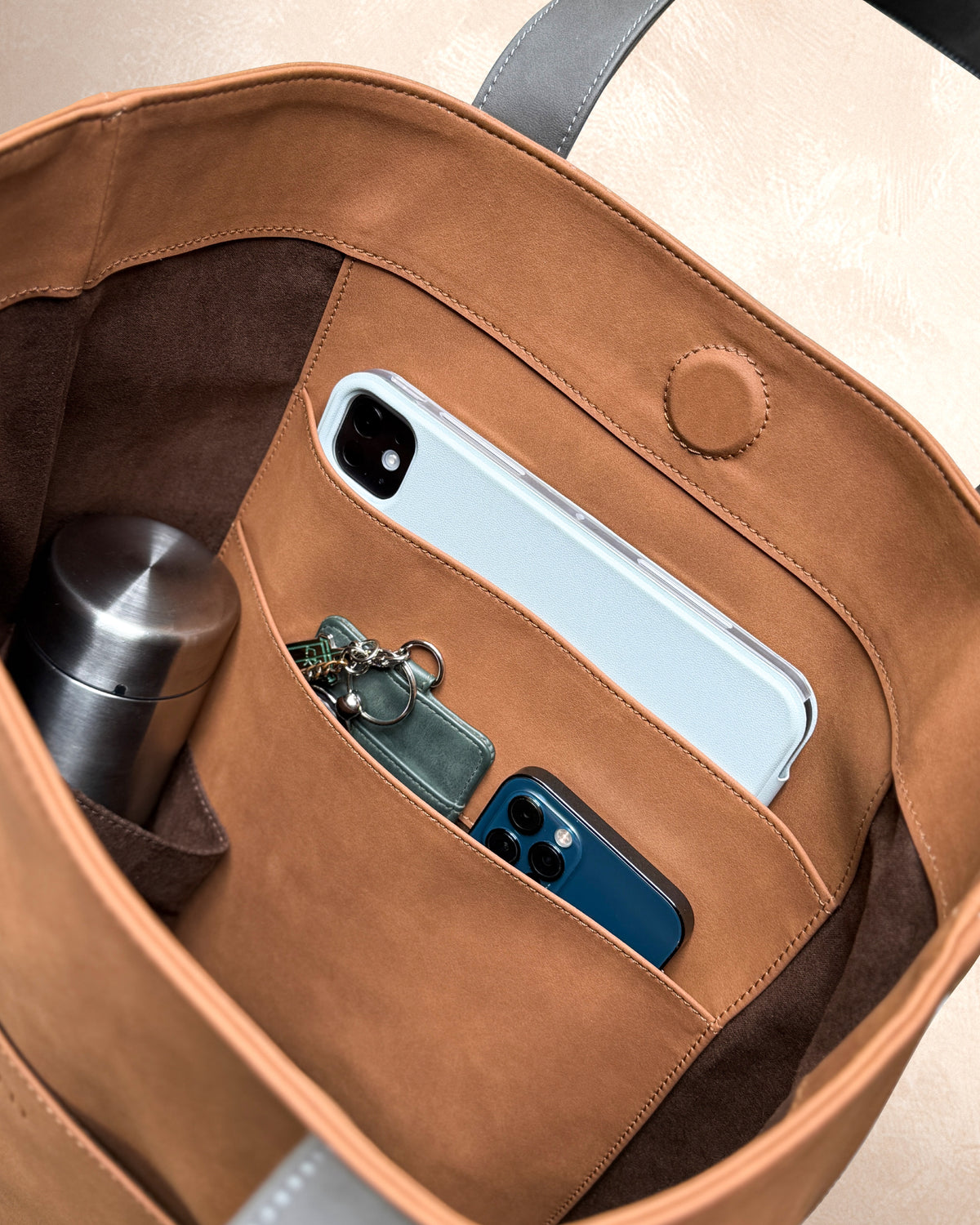 Interior compartments of Tern Toku L carry-all tote bag. Ipad, everyday essentials and more
